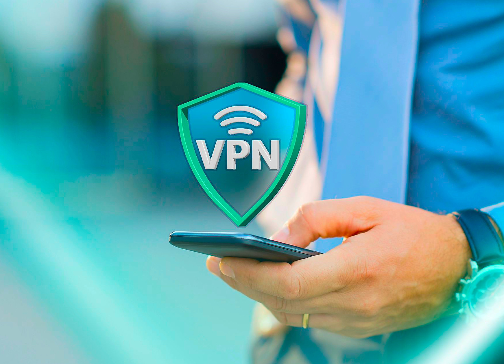 A person holding a phone with a VPN icon hovering above the screen.