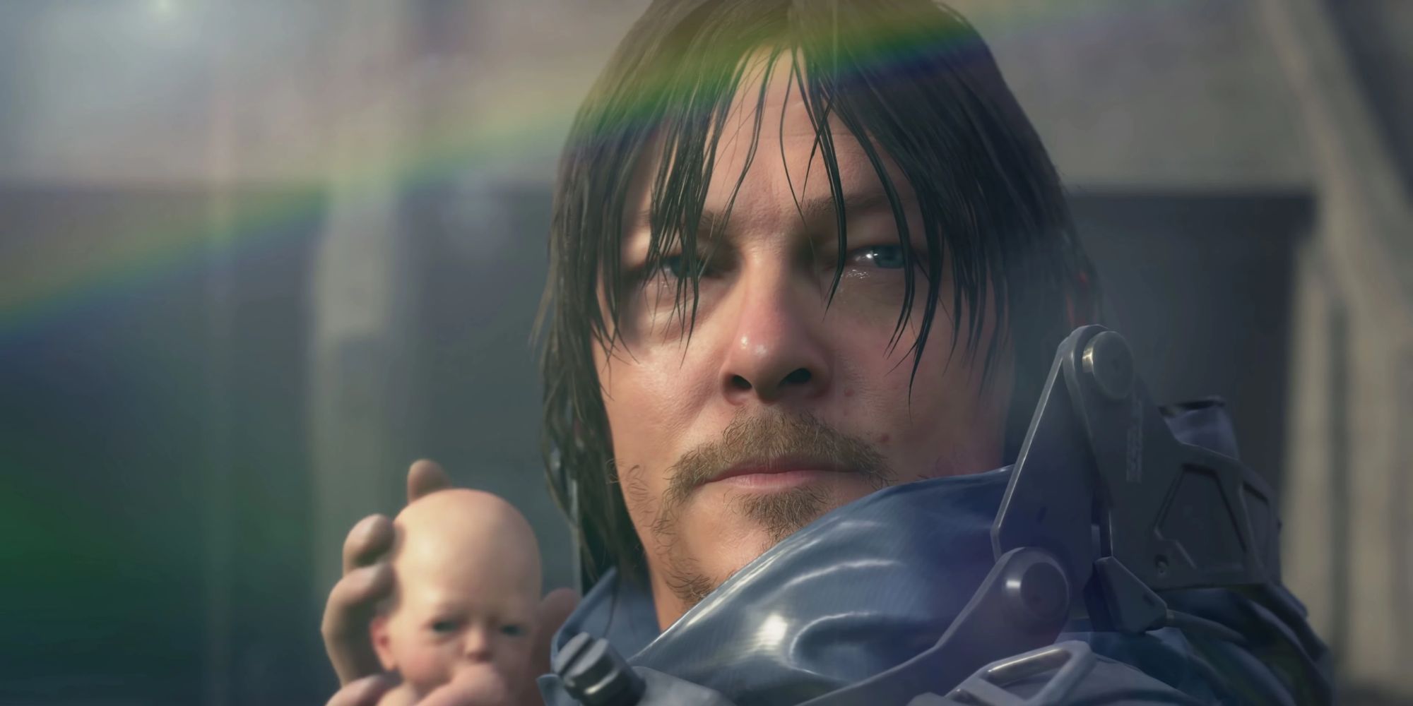 Sam Porter Bridges played by Norman Reedus holding a baby in his arms in Death Stranding