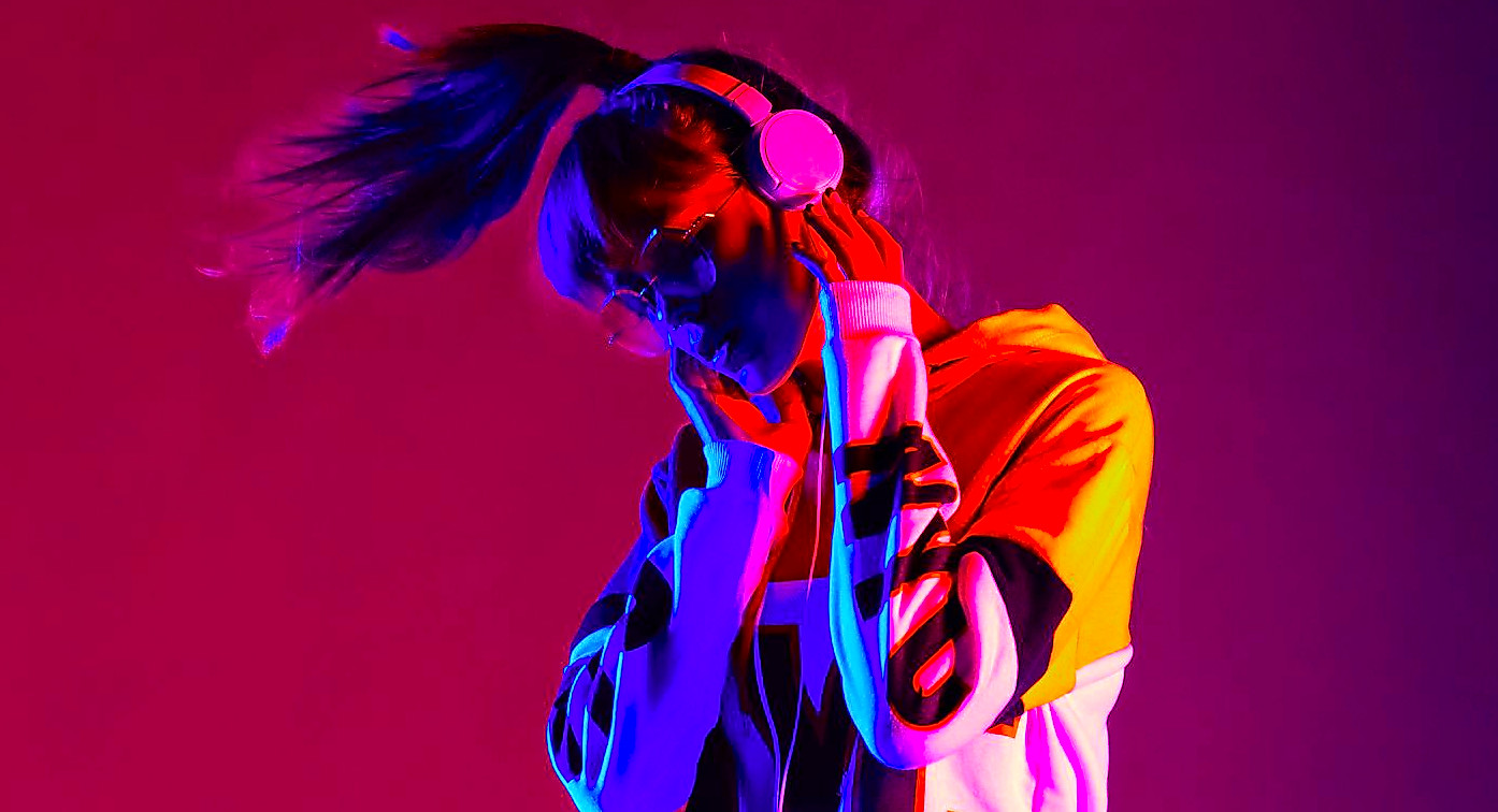 woman listening to music with headphones