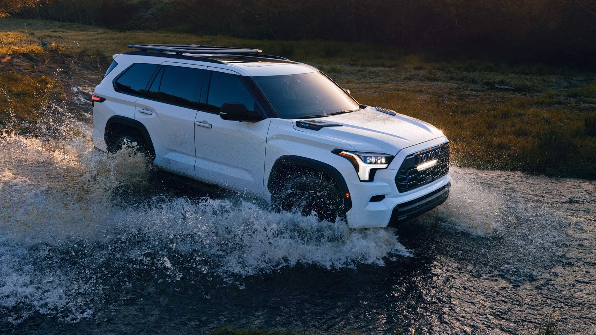 A White 2024 Toyota Sequoia TRD Pro Driving Through Water