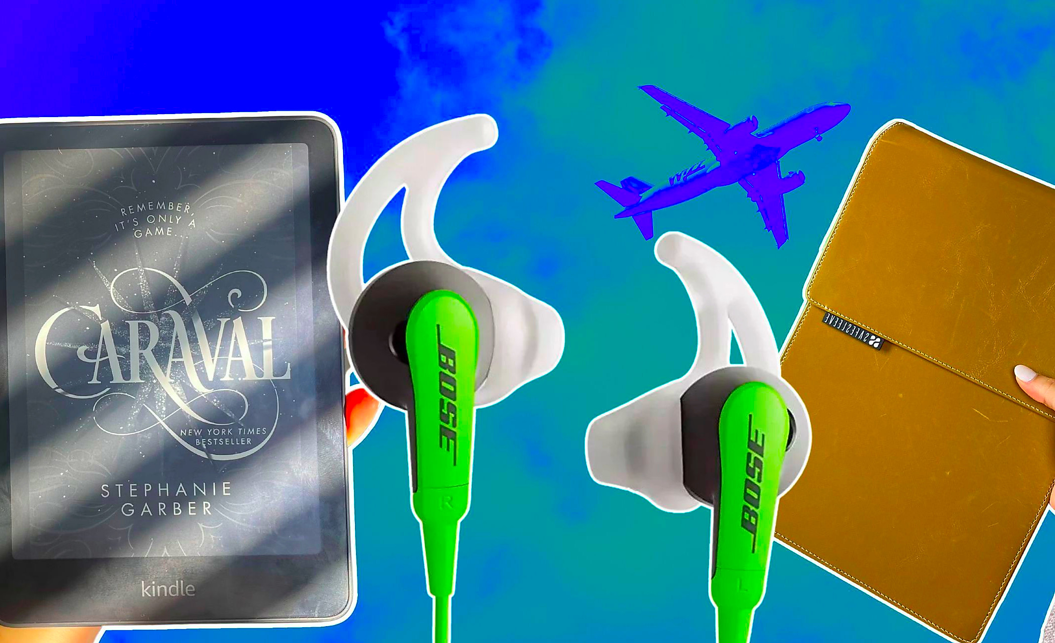 A Kindle, laptop sleeve, and wired headphones. 