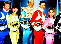 David Yost, Thuy Trang, Jason David Frank, Austin St. John, Amy Jo Johnson, and Walter Emanuel Jones as the original Power Rangers.