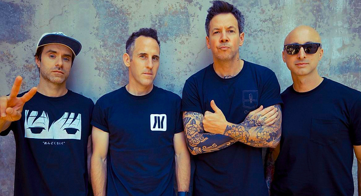 Sébastien Lefebvre, Chuck Comeau, Pierre Bouvier, and Jeff Stinco from Simple Plan.