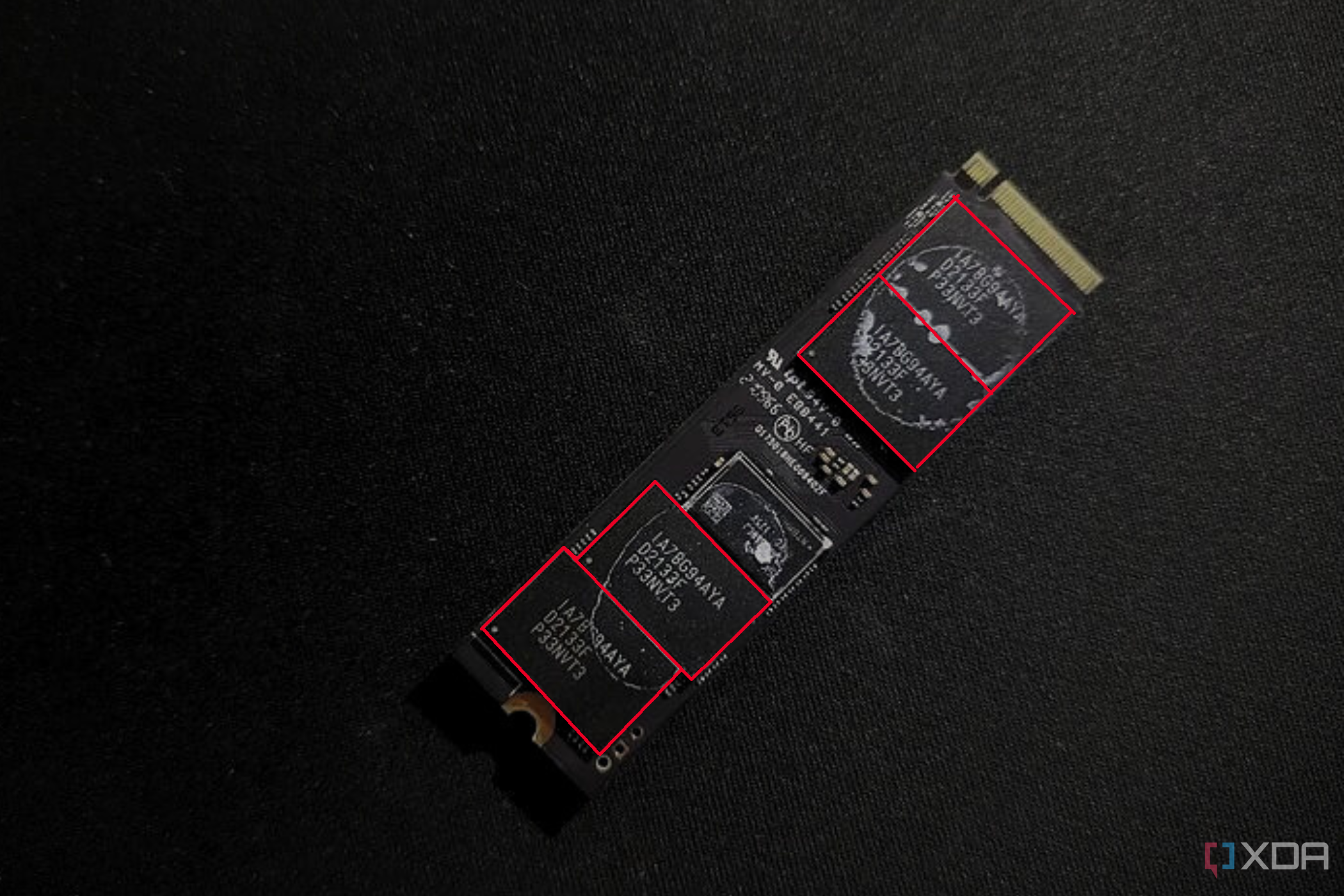 Image showing the NAND Flash chips on a MSI Spatium M480 on a black background