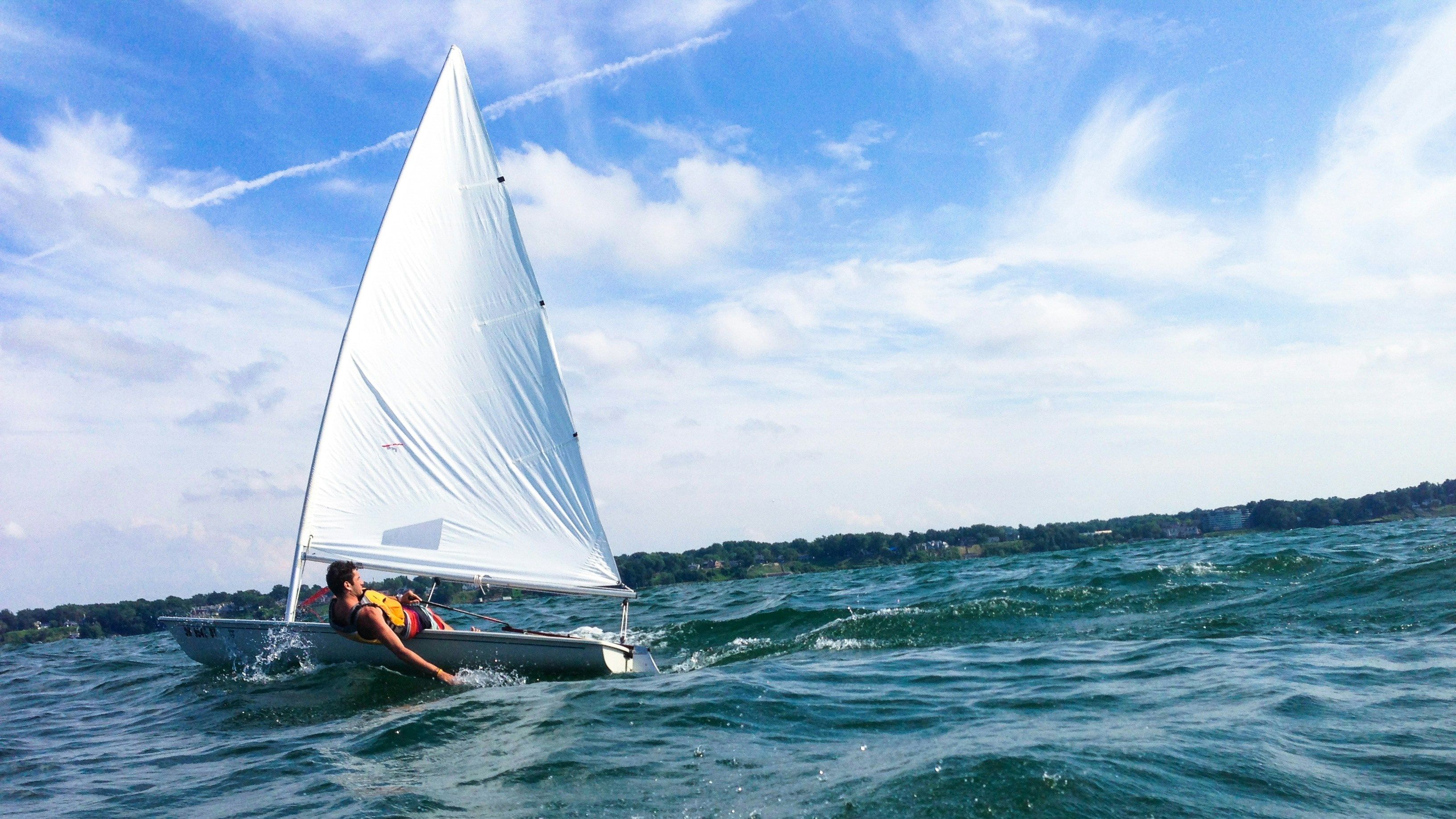 Person in sailboat on Lake Erie