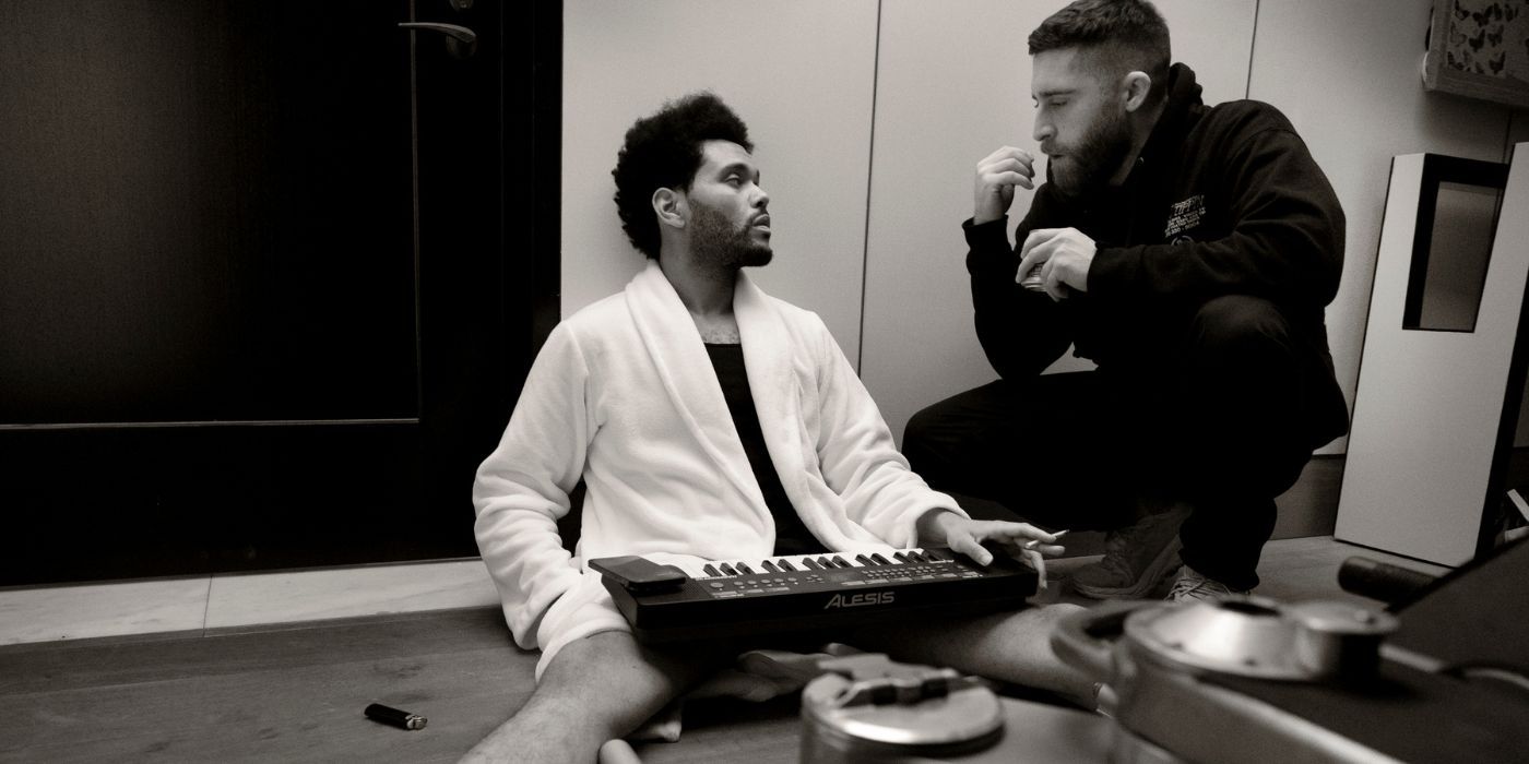 A black and white still of The Weeknd and Trey Edward Shults on the set of Hurry Up Tomorrow