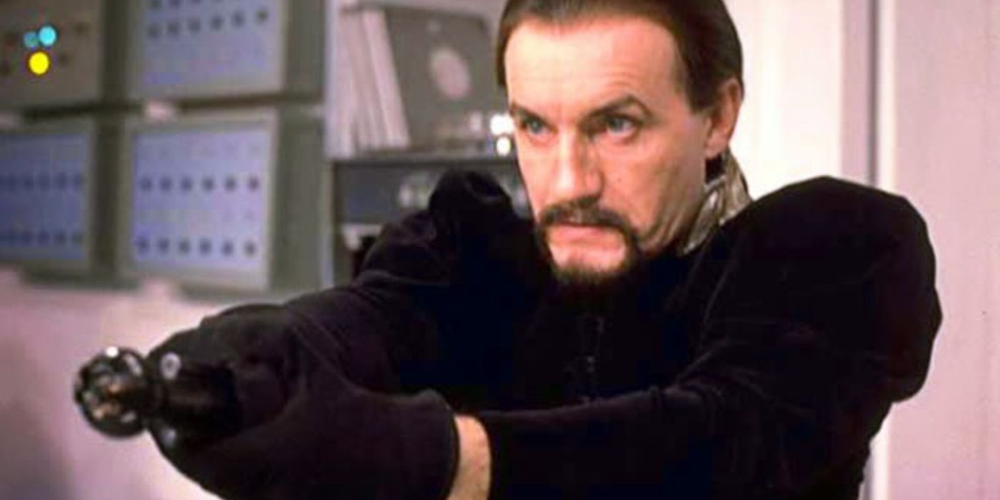 Anthony Ainley as The Master pointing a weapon in Doctor Who