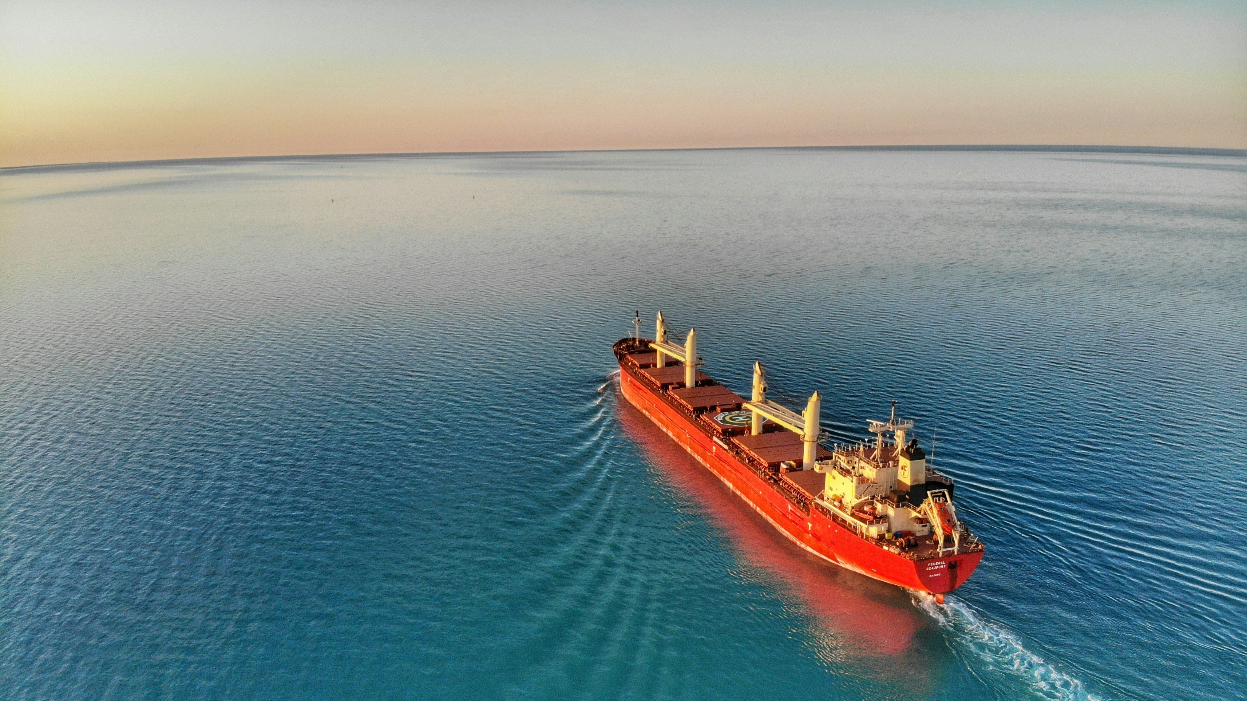 Red cargo boat on Lake Huron