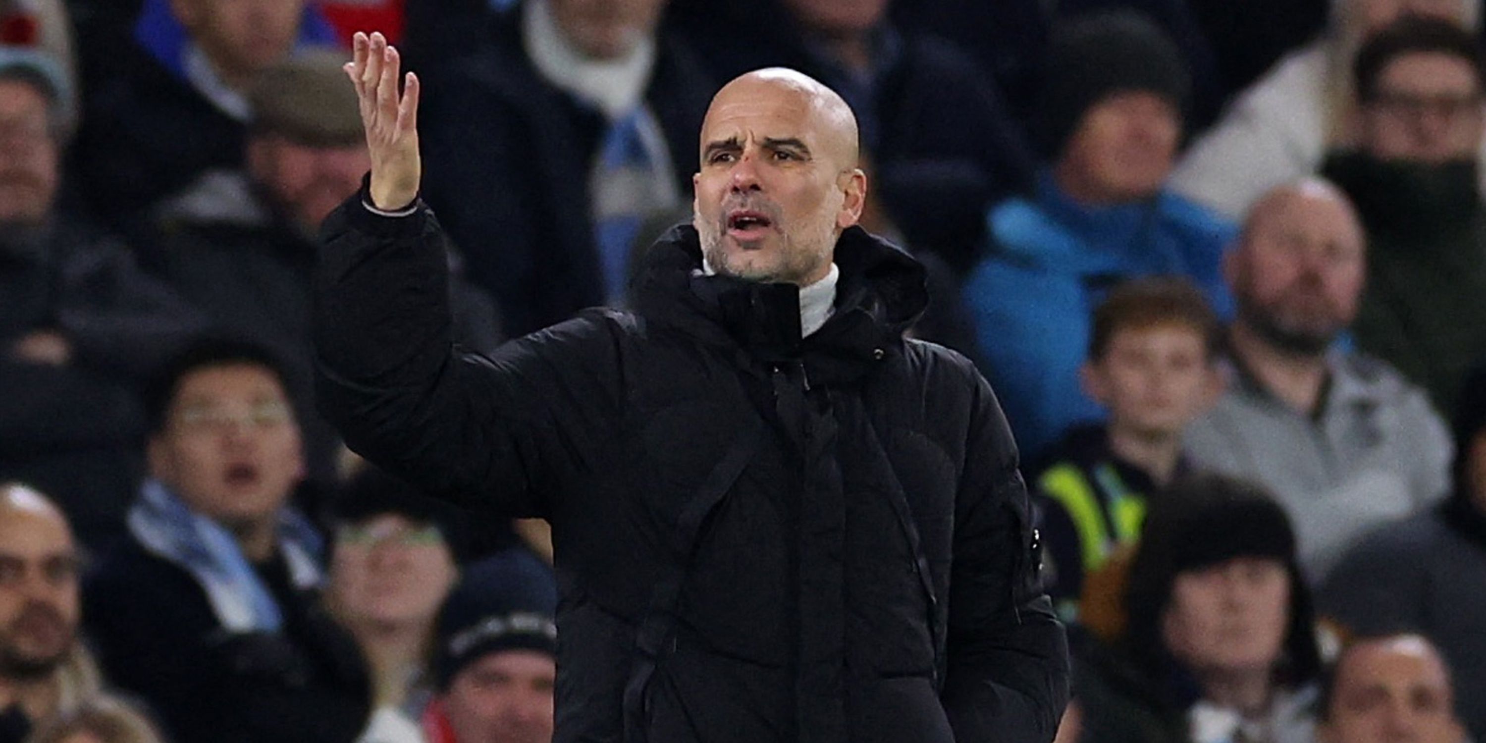 Manchester City boss Pep Guardiola reacts to a decision on the touchline