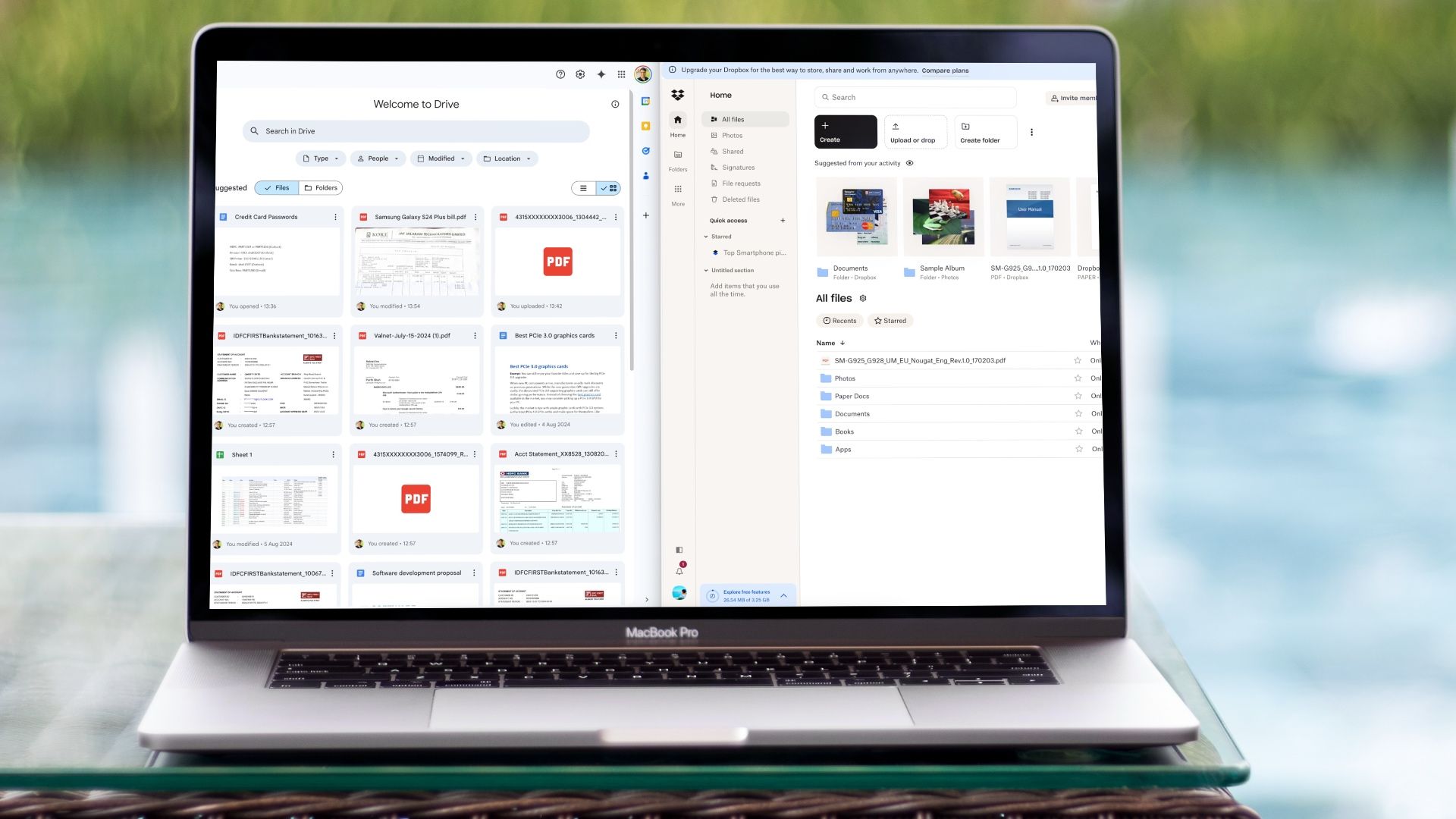 A comparison between Google Drive and Dropbox displayed on a MacBook Pro screen