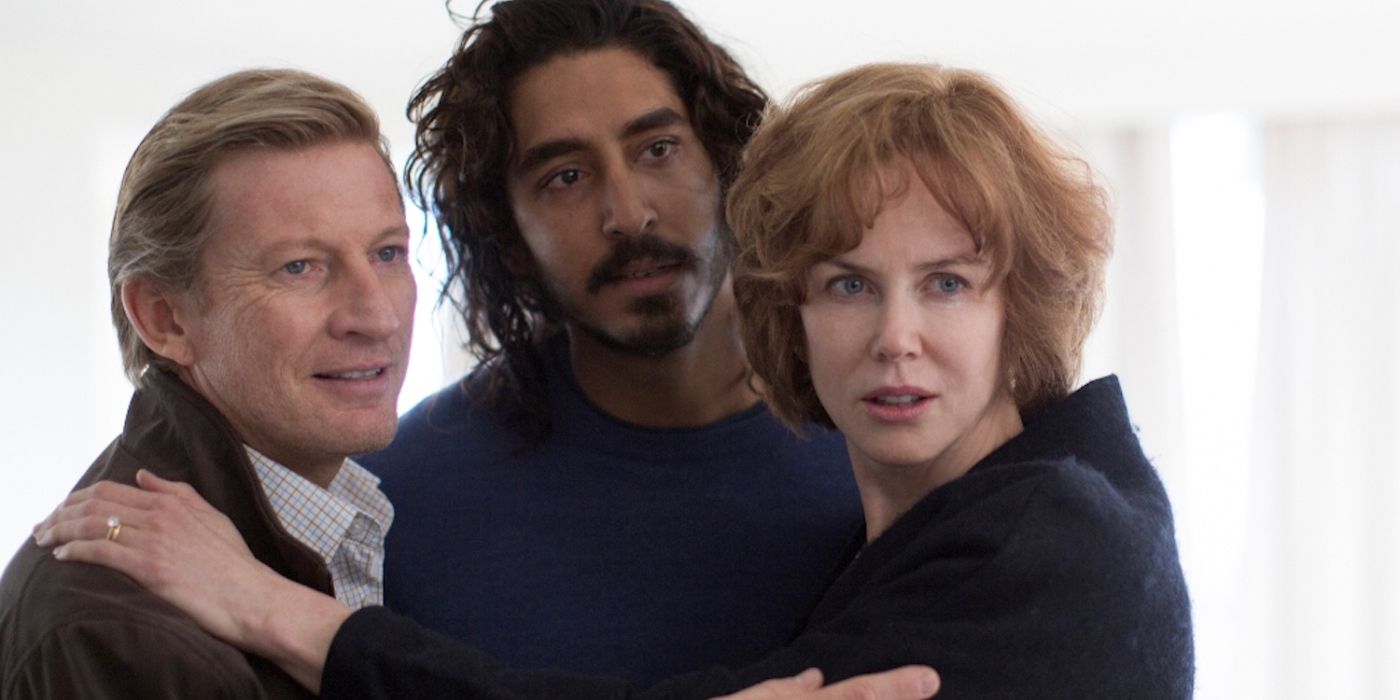 David Wenham, Dev Patel, and Nicole Kidman holding each other in 'Lion'