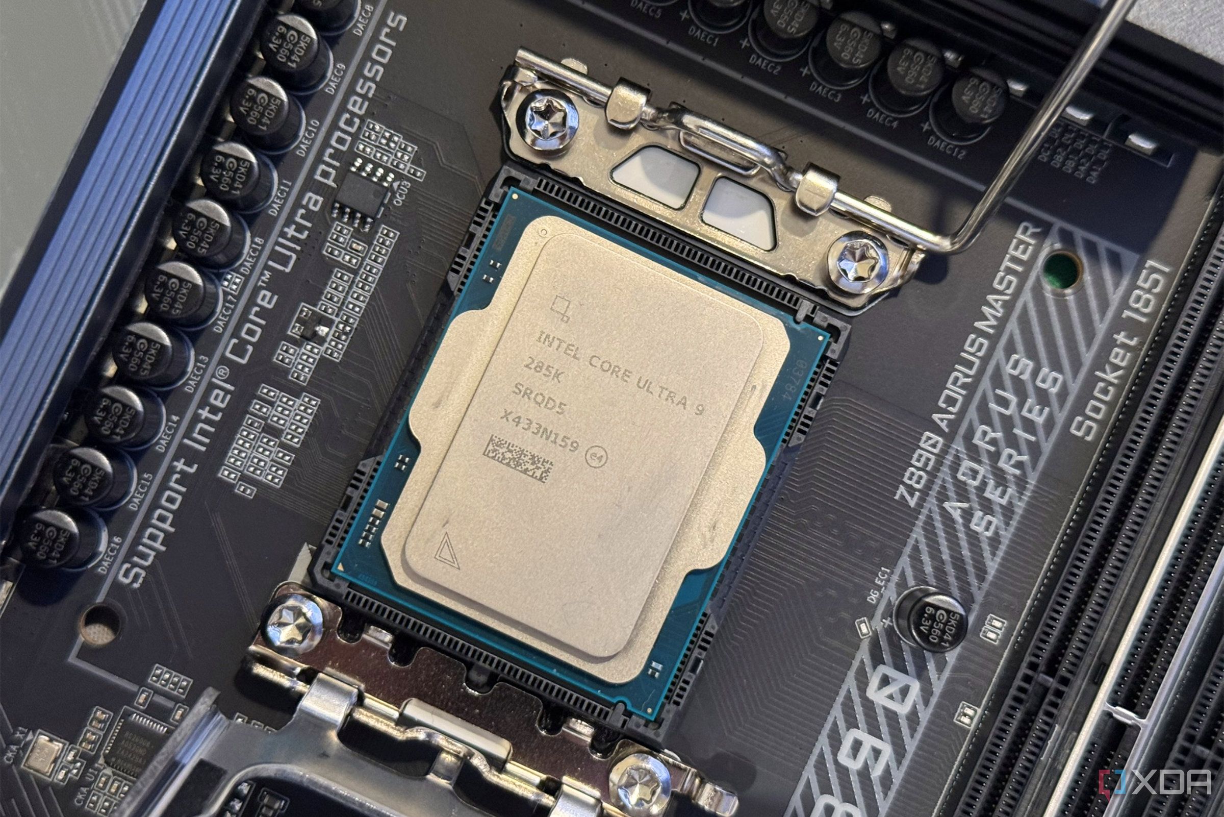 intel core ultra 9 285k in socket with retaining clip open