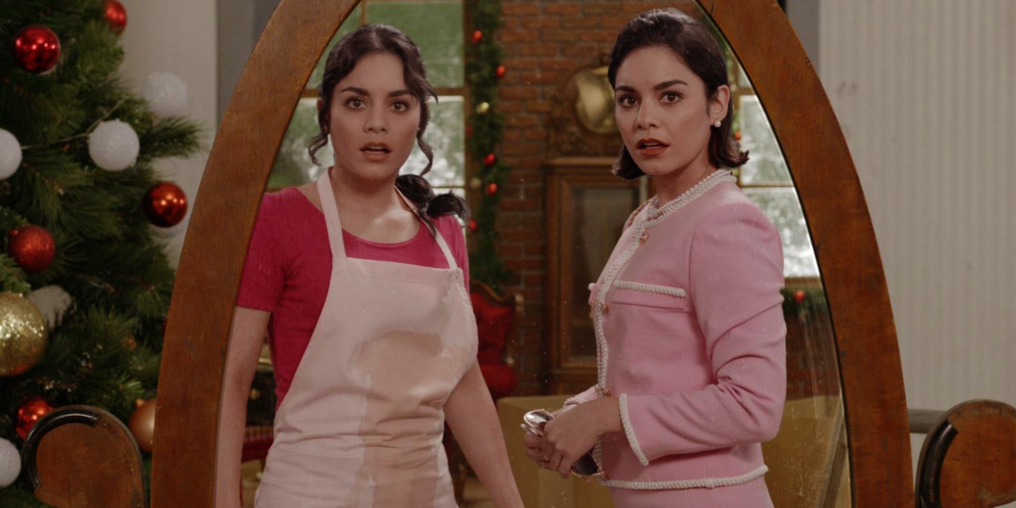 Vanessa Hudgens as identical strangers marveling at their resemblance in a mirror in The Princess SwitCh.