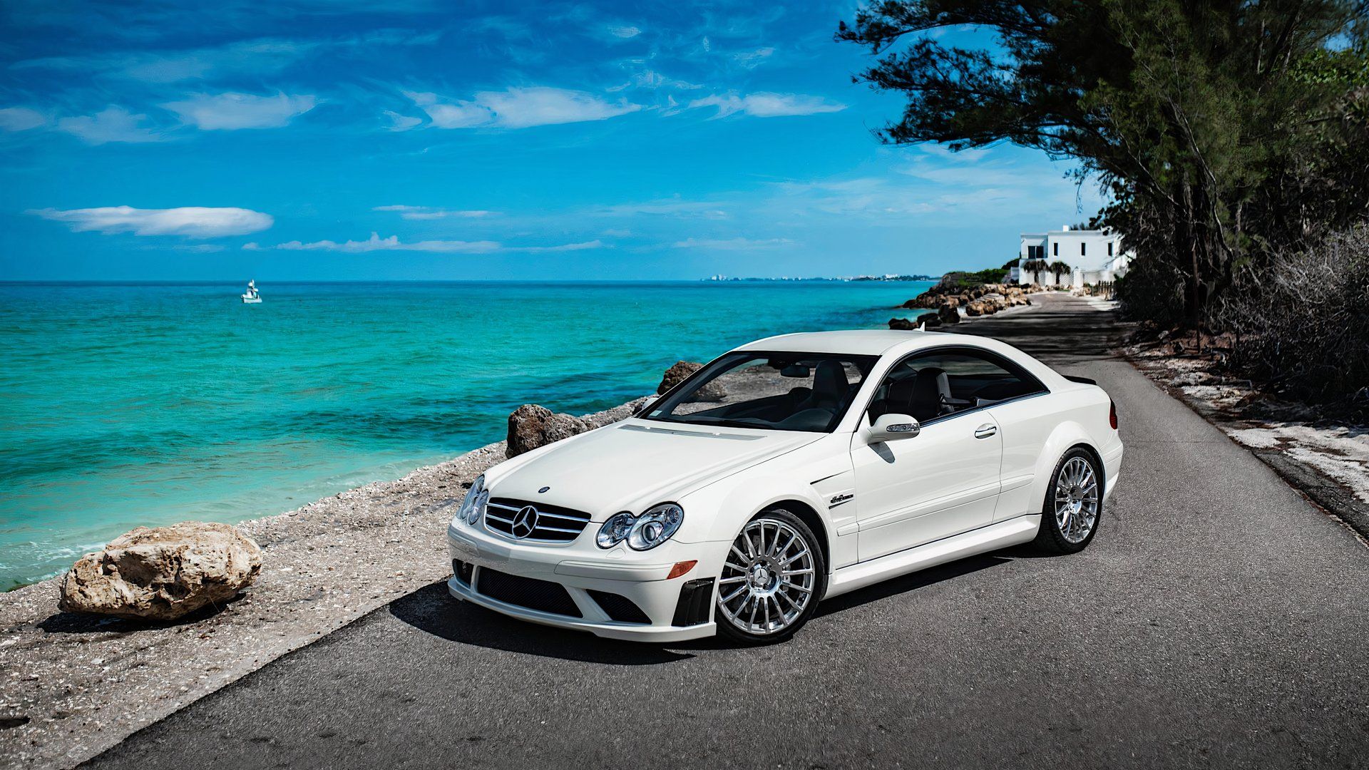 2008 Mercedes-Benz CLK63 AMG Black Series in white posing on coast road 