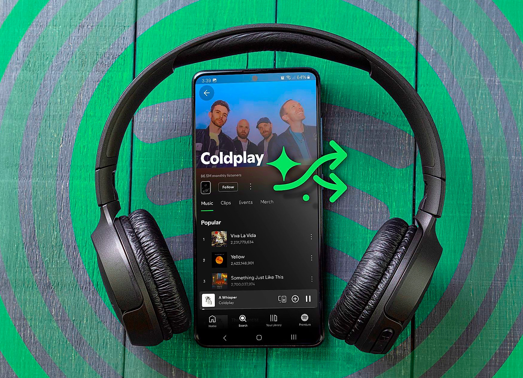 A headphone with a phone playing music on Spotify.