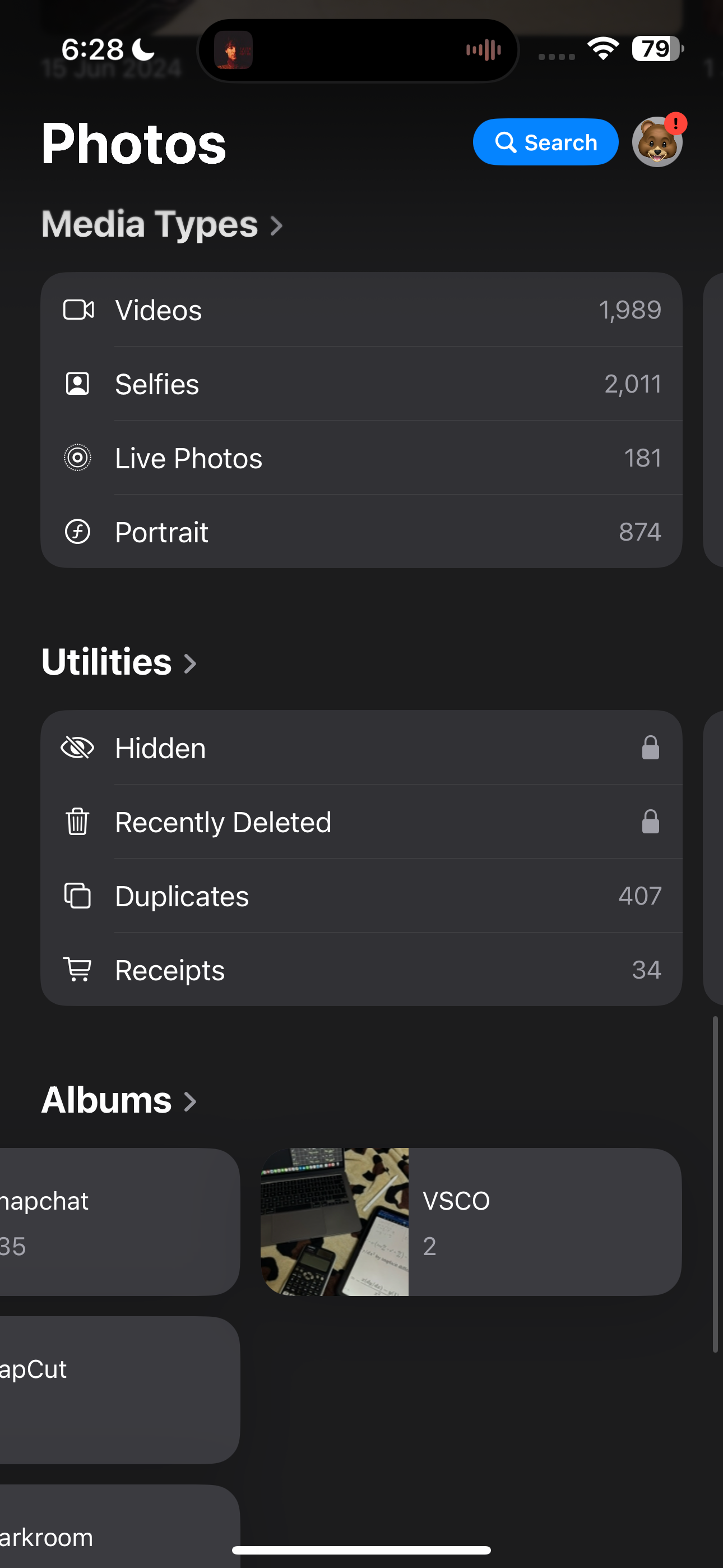 Photos app with Media Types and Utilities section on an iPhone