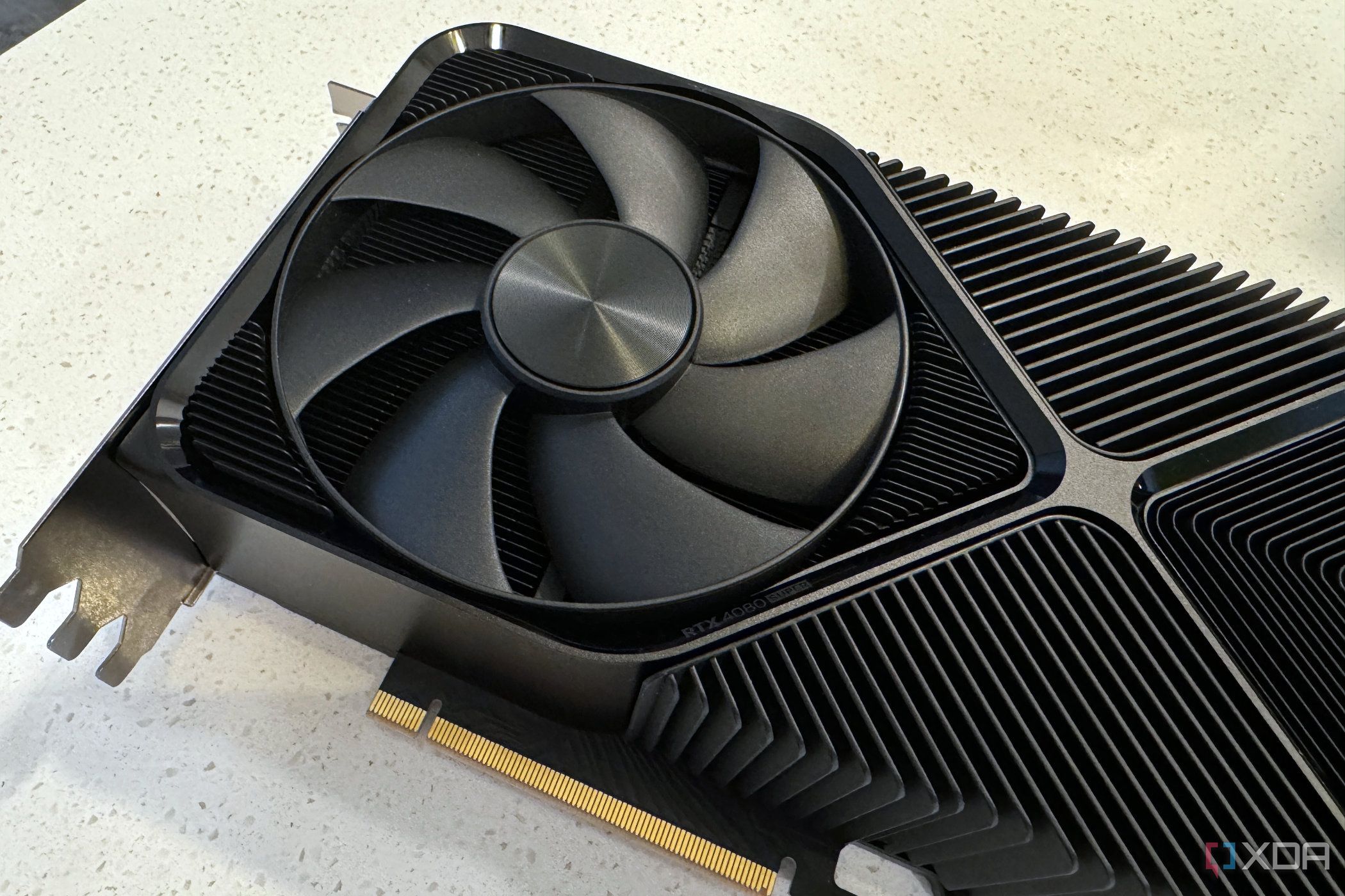 nvidia geforce rtx 4080 super fe closeup to show the large fan near the io shield