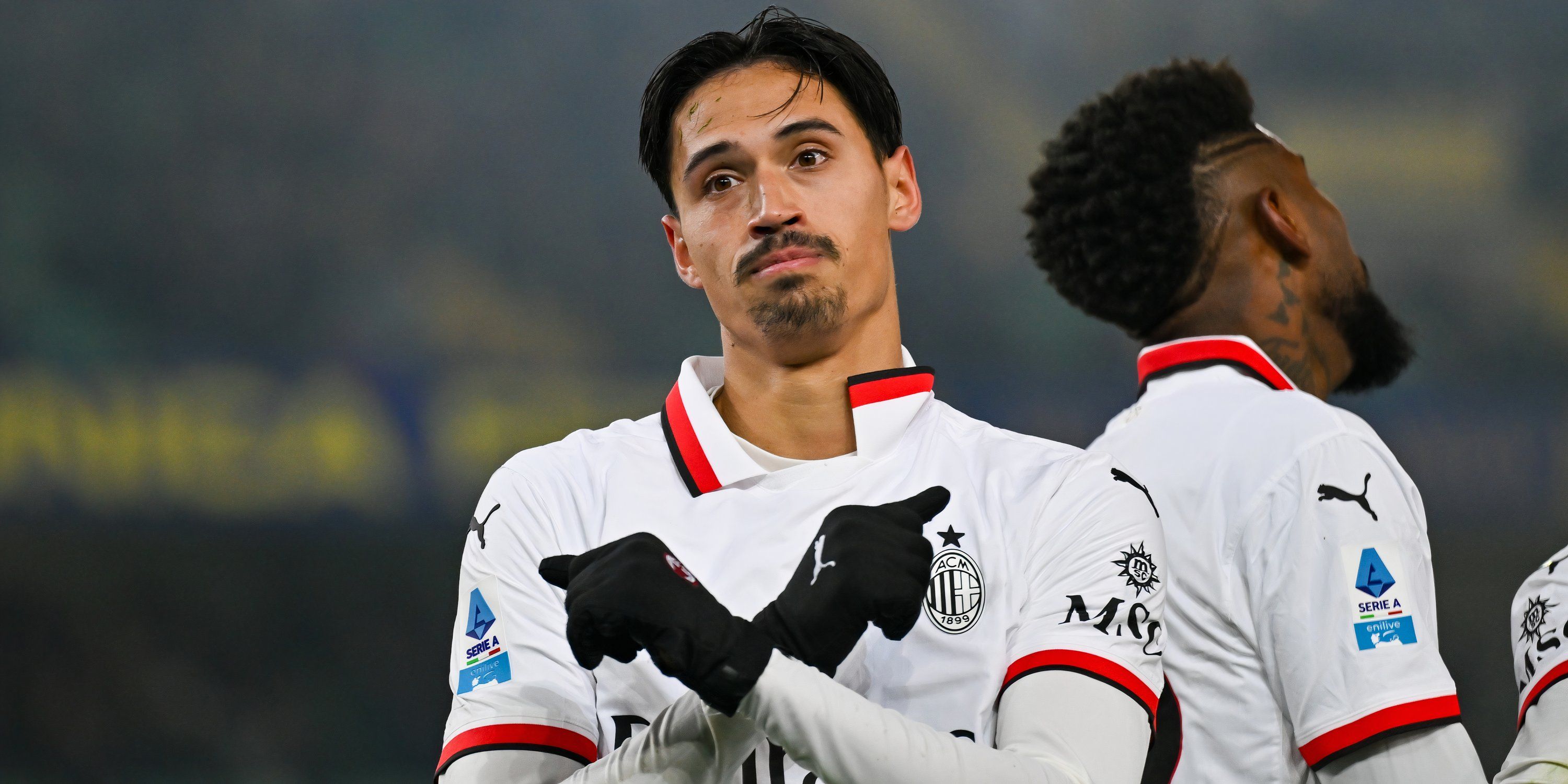 Tijjani Reijnders celebrating after scoring for AC Milan