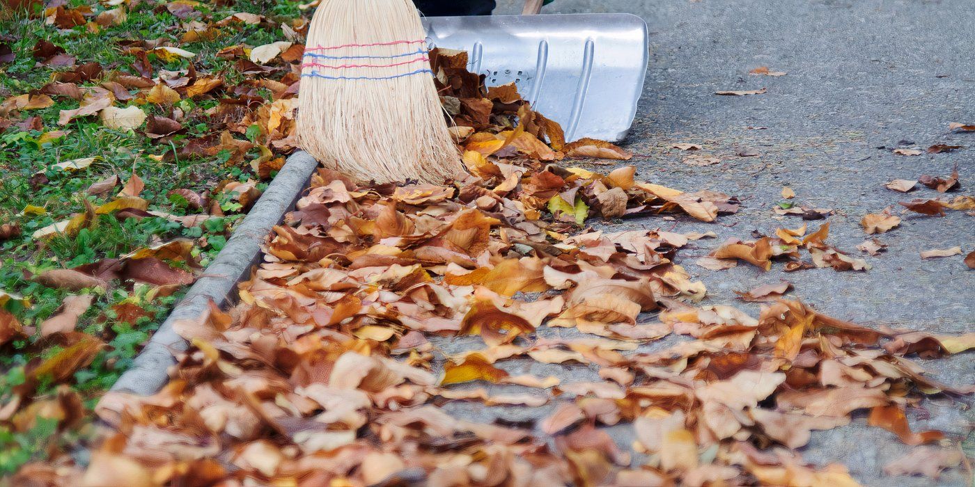 Sweeping leaves from a path